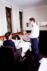 Image showing man and woman in restaurant for dinner