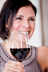 Image showing couple drinking red wine in restaurant