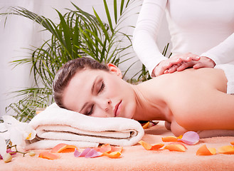 Image showing young attractive smilig woman doing wellness spa