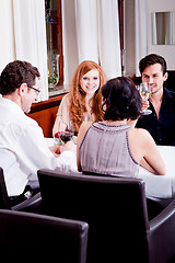 Image showing smiling happy people in restaurant