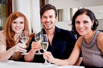 Image showing smiling happy people in restaurant