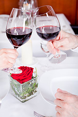 Image showing couple drinking red wine in restaurant