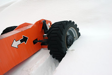 Image showing Tractor winter tyres in extreme snowdrift