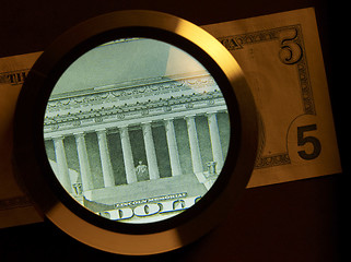 Image showing dollar and magnifier