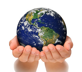 Image showing Woman holding globe on her hands, South and North America