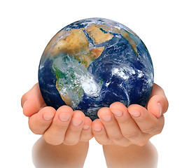 Image showing Hands of woman holding globe, Africa and Near East