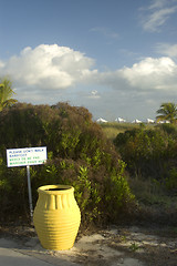 Image showing dunes with sign