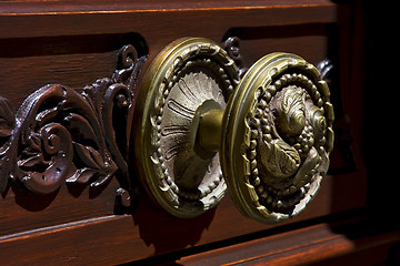 Image showing  brown knocker in a closed wood