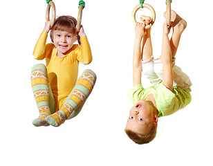 Image showing children playing and exercising on gymnastic rings