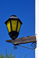 Image showing street lamp  and a wall of house in calle los suspiros