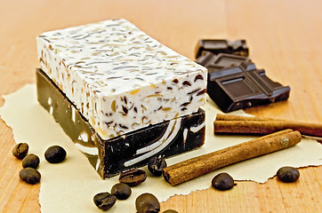 Image showing Soap homemade with chocolate and cinnamon on the board