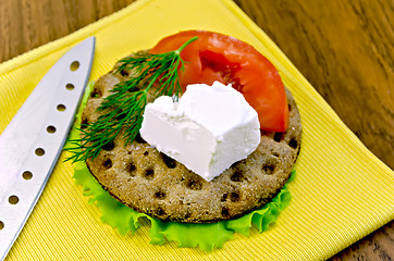 Image showing Feta piece with tomato on crispbread