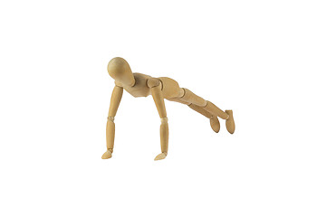 Image showing Wooden woman figure in action