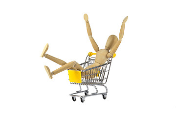 Image showing Wooden female doll in shopping madness