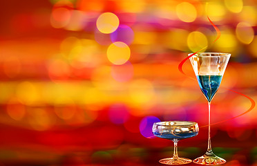 Image showing Two blue curacao cocktails and city illumination