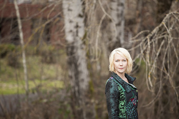 Image showing Blonde Woman in Very Colorful Winter Coat