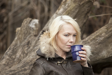 Image showing Blonde Woman with Beautiful Blue Eyes