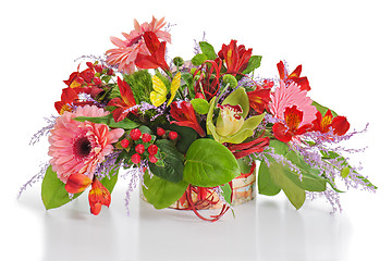 Image showing Colorful floral arrangement from lilies, cloves and orchids in c