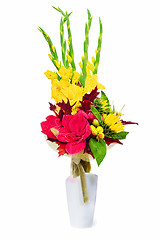 Image showing Bouquet from gladioluses arrangement centerpiece in vase isolate