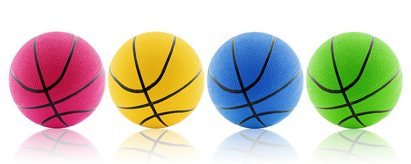 Image showing four colorful balls with reflection