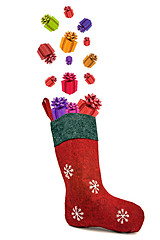 Image showing Gifts coming out of red christmas sock