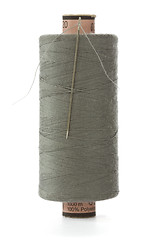 Image showing grey bobbin thread with a needle