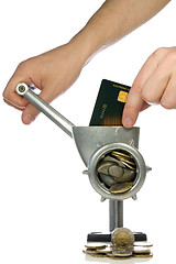 Image showing credit card mincing in a meat grinder