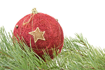 Image showing red christmas bauble and pine branch