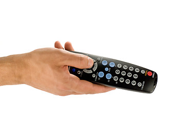 Image showing Hand holding TV remote control