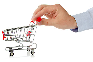 Image showing hand with shopping cart 