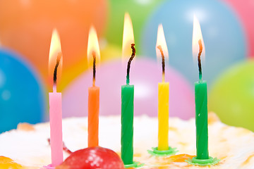 Image showing birthday cake with colorful candles