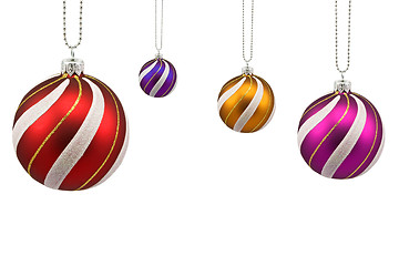 Image showing four colorful christmas baubles