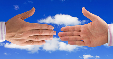 Image showing Handshake on sky background