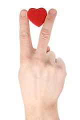 Image showing hand with heart over white