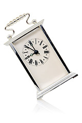 Image showing old analogue clock show nine o'clock