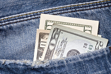 Image showing money in a blue jeans pocket