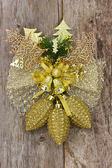 Image showing Golden christmas decoration on the wall