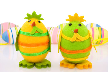 Image showing decorative easter chicks and colorful eggs