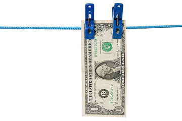 Image showing one dollar  hung on a washing line