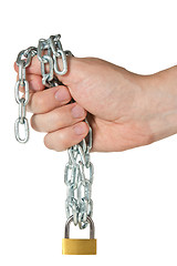 Image showing Hand holding chain with padlock