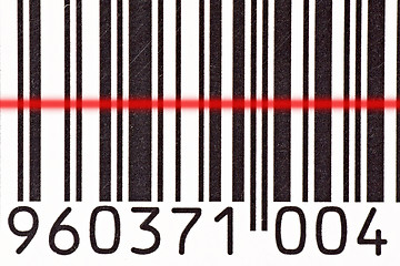 Image showing barcode reader scanning a bar code