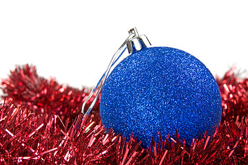 Image showing blue bauble on a red garland