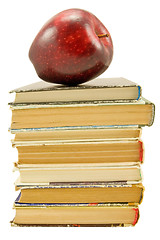 Image showing books with red apple over white