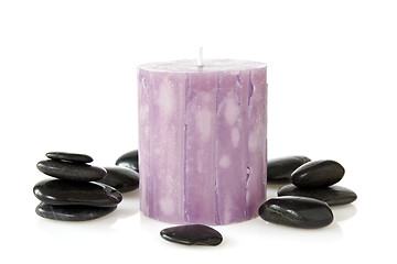 Image showing aromatic candle and black pebbles