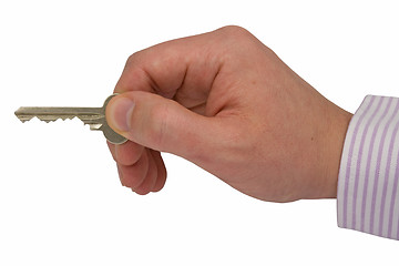 Image showing hand with key 