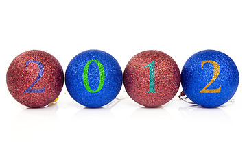 Image showing Christmas baubles with 2012 date