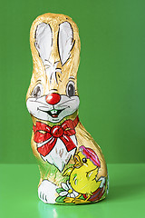 Image showing chocolate easter bunny on green background