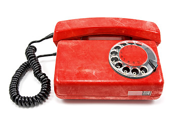 Image showing old scratched red telephone