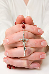 Image showing female praying with rosary