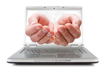 Image showing open palms coming out of a laptop